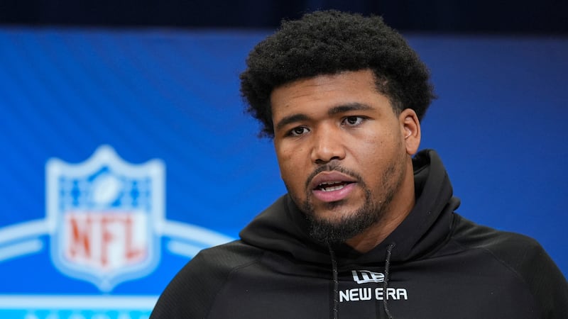 Oregon defensive lineman Derrick Harmon speaks during a press conference at the NFL football...